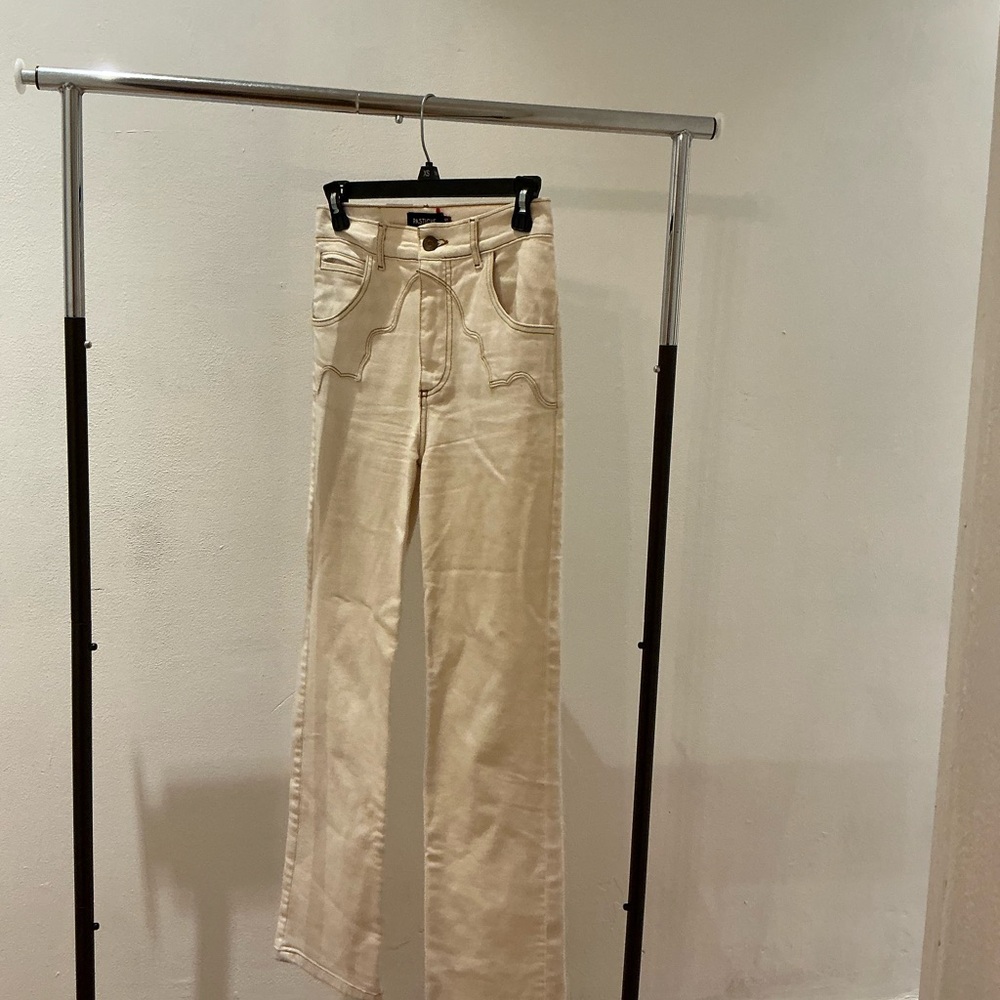 Cream High-Waisted Jeans